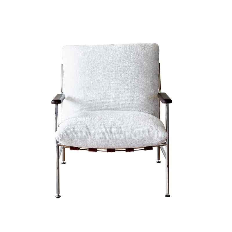 White upholstered chair with metal frame on a white background