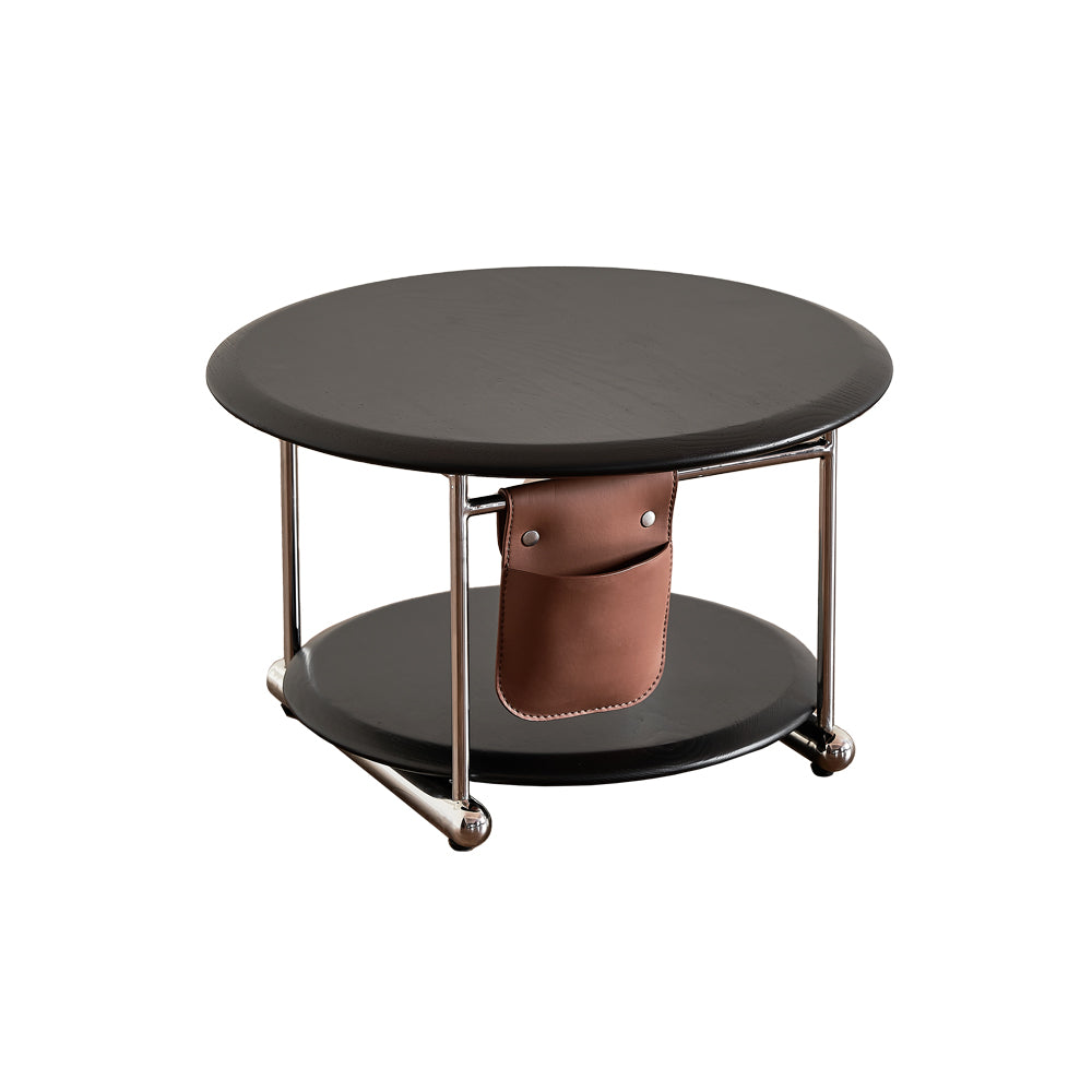 Round coffee table with a brown leather pouch on a white background