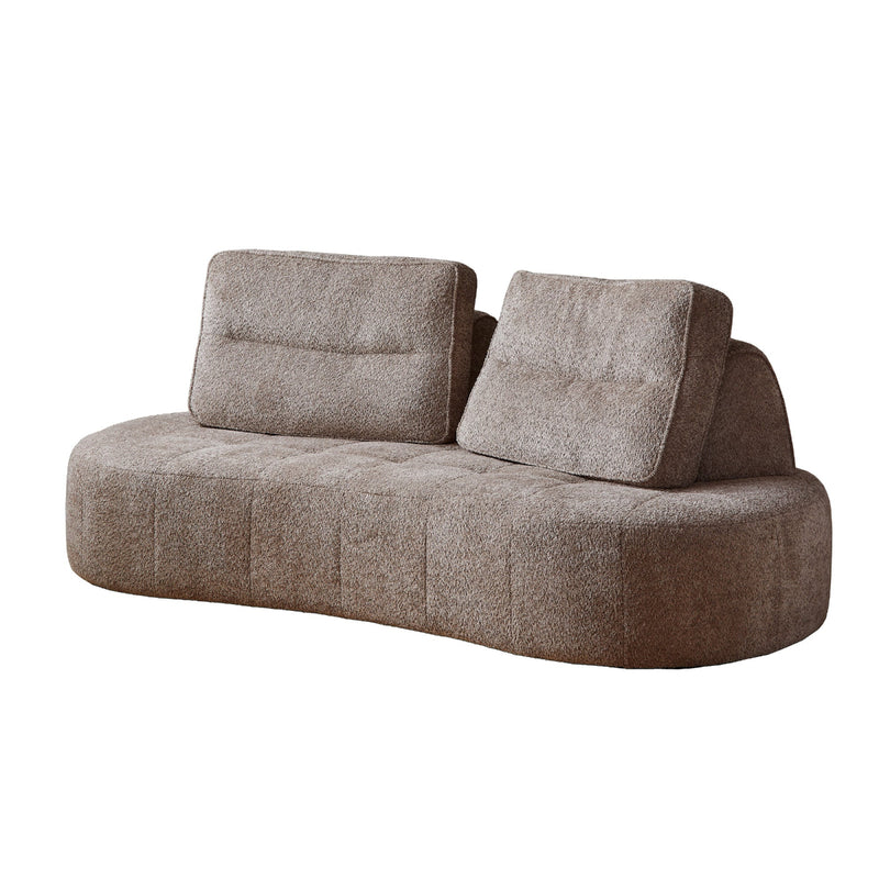 A modular curved sofa with gray upholstery.