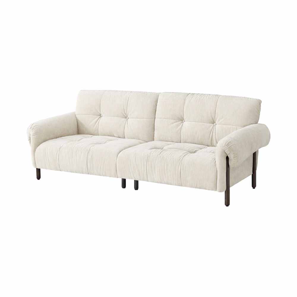 An off-white tufted fabric sofa with dark wooden legs, shown from a three-quarter angle against a plain white background.