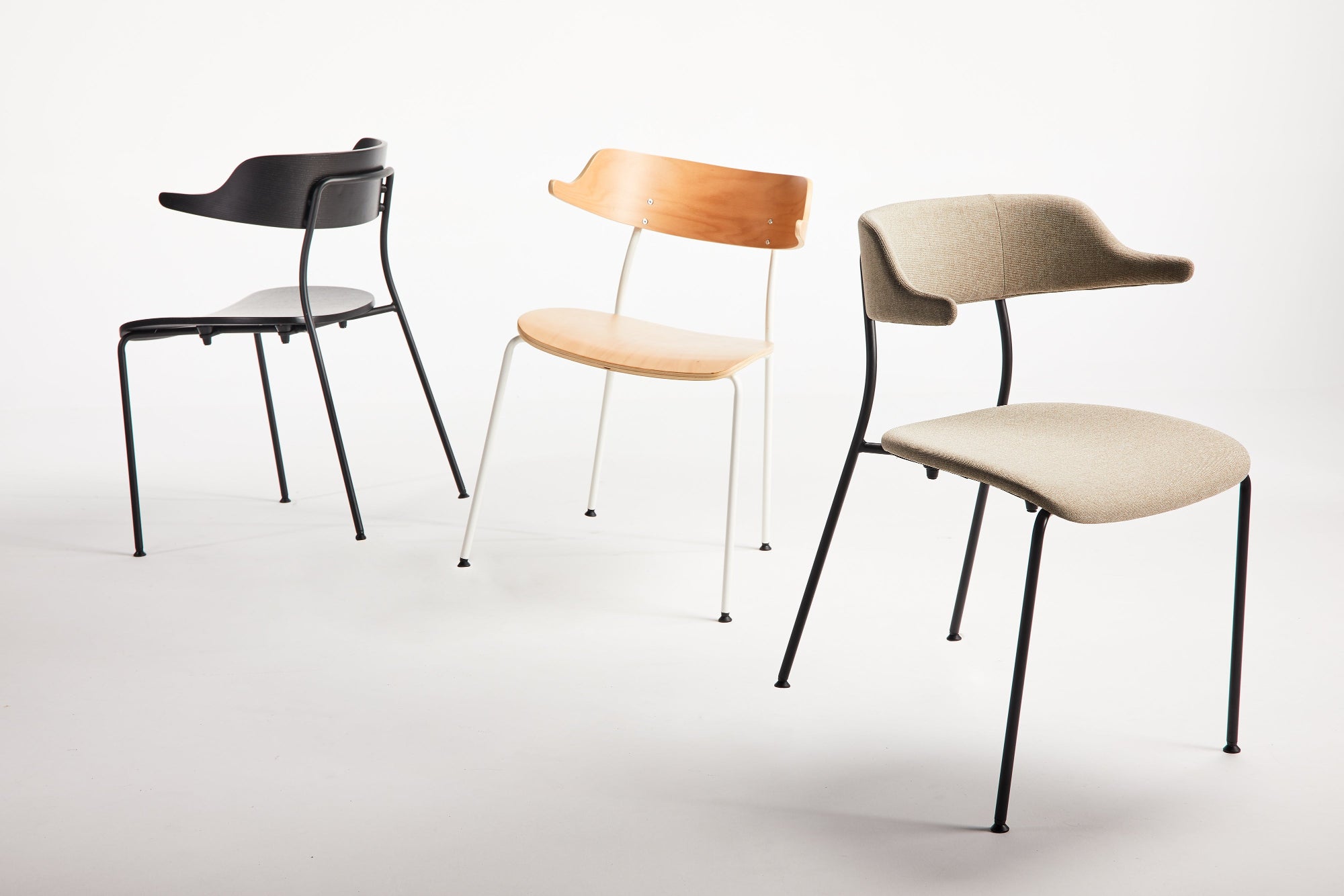 Three chairs with different seat and back cover options on a white background