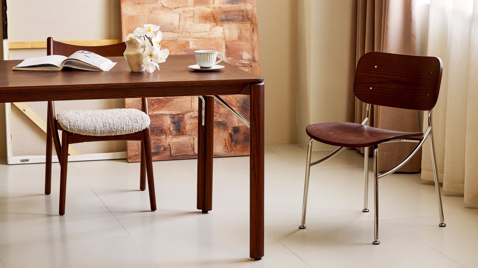 Dining table with chairs in a room setting