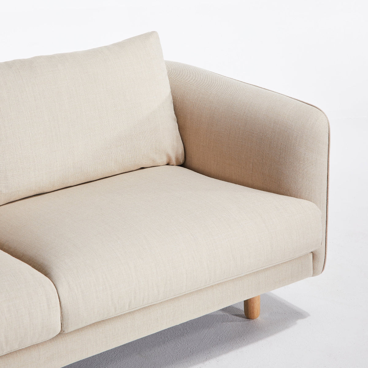 Beige sofa on a white background