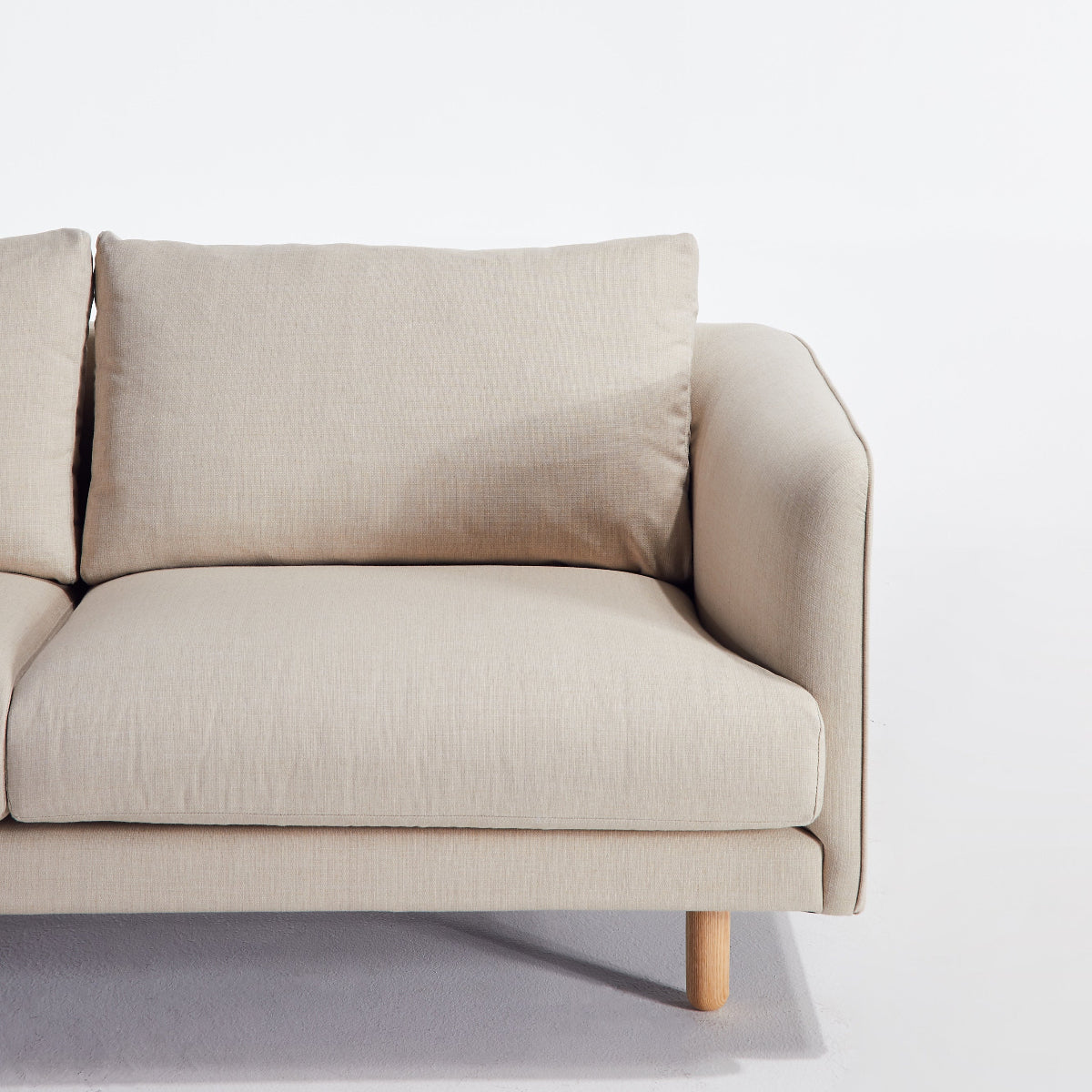 Beige sofa on a white background