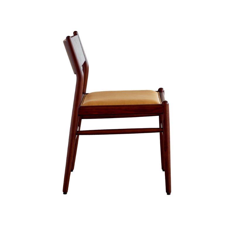 Wooden chair with tan seat cushion on a white background